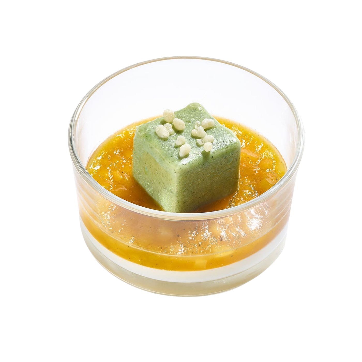 Milchreis-Dessert mit Kokos, Mango, Szechuanpfeffer und Kaffirlimette im Fine Dining Glas